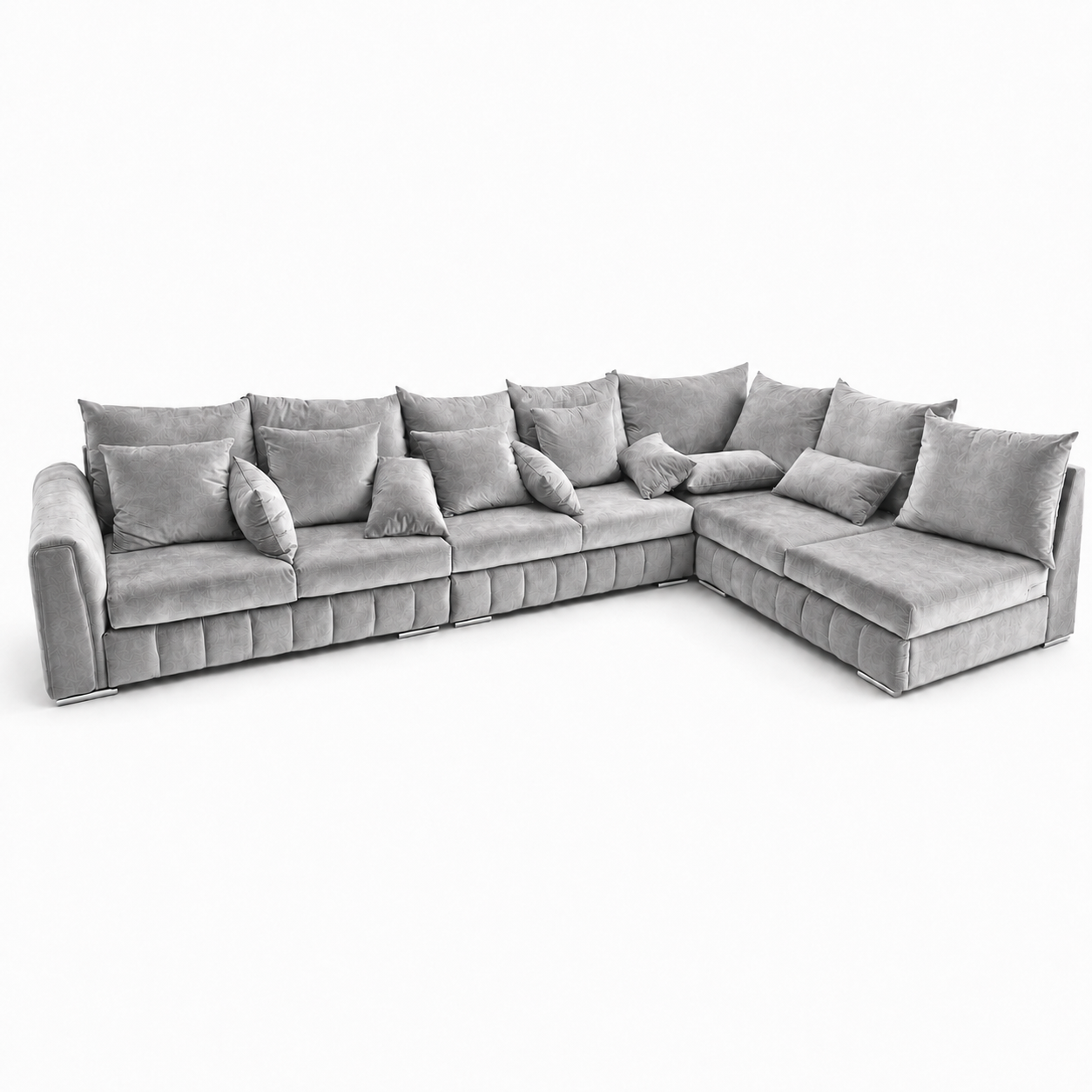 Grey corner sofa with loose back cushions against a white background.
