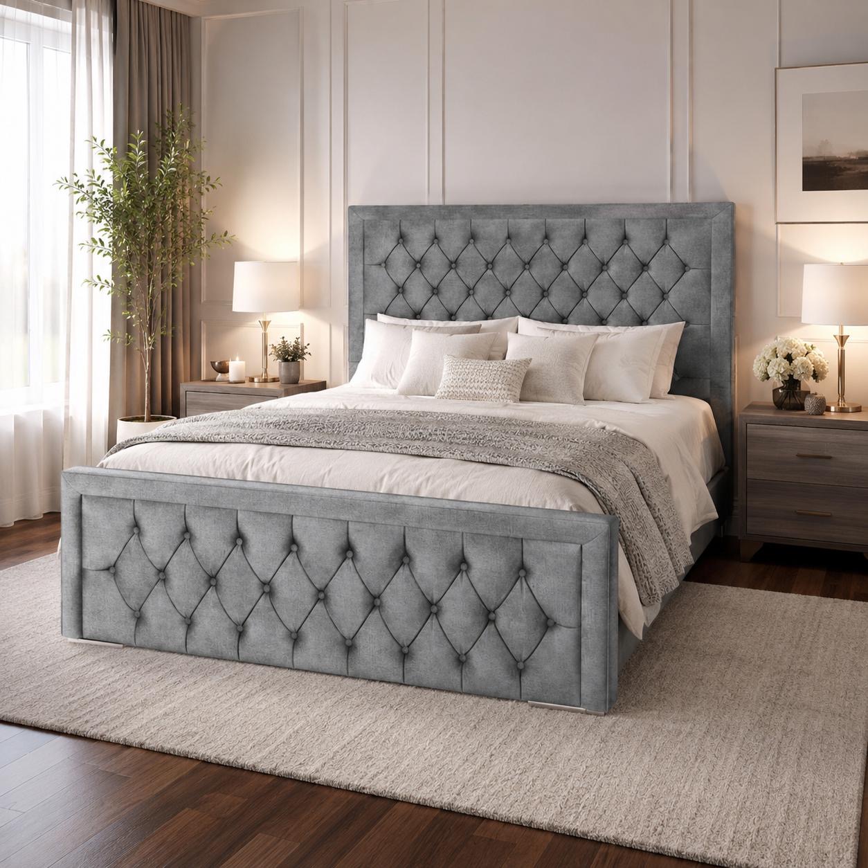Grey upholstered bed with diamond-pattern padded detailing.